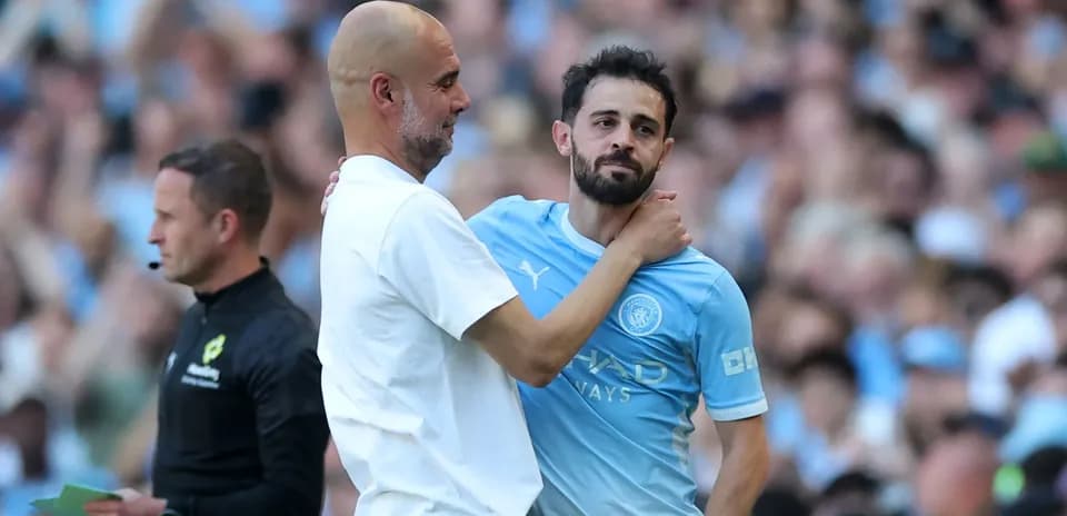 Pep Guardiola and Bernardo Silva during a match