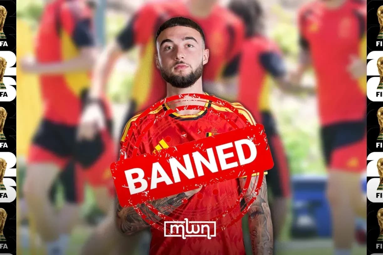 Игрок в форме Испании с отметкой 'ЗАБОРОНЕН' на фоне тренировки
